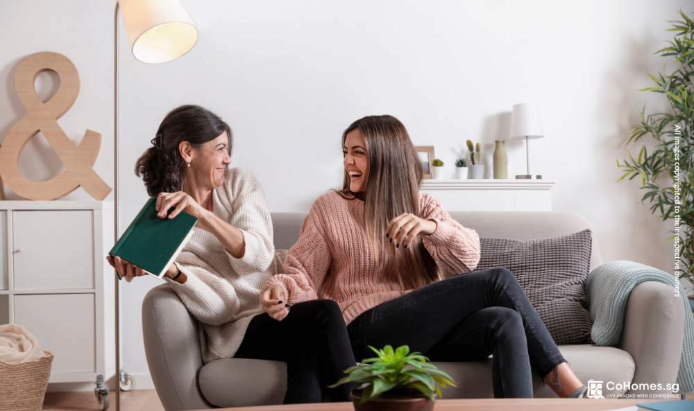 Two friends discussing household boundaries while sharing a home