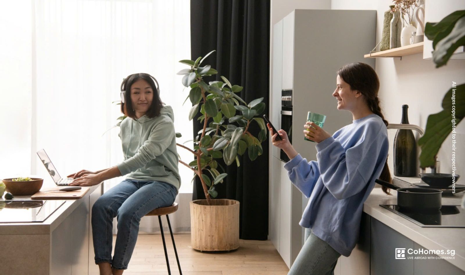 Two women chatting in a kitchen