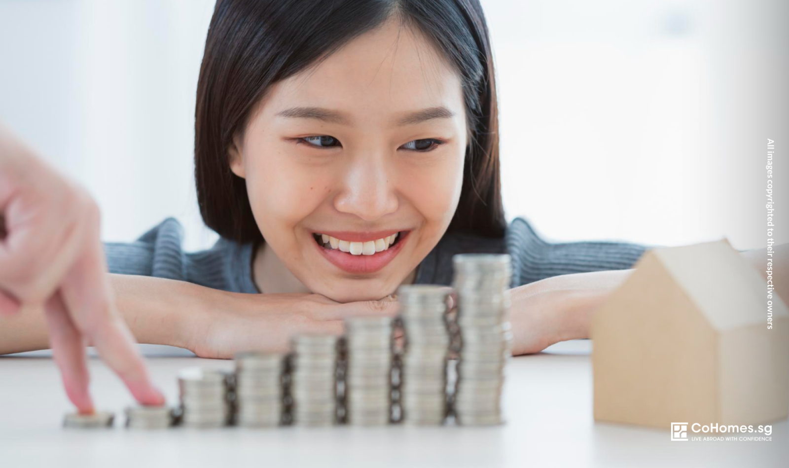 Smiling woman seeing her property value rise