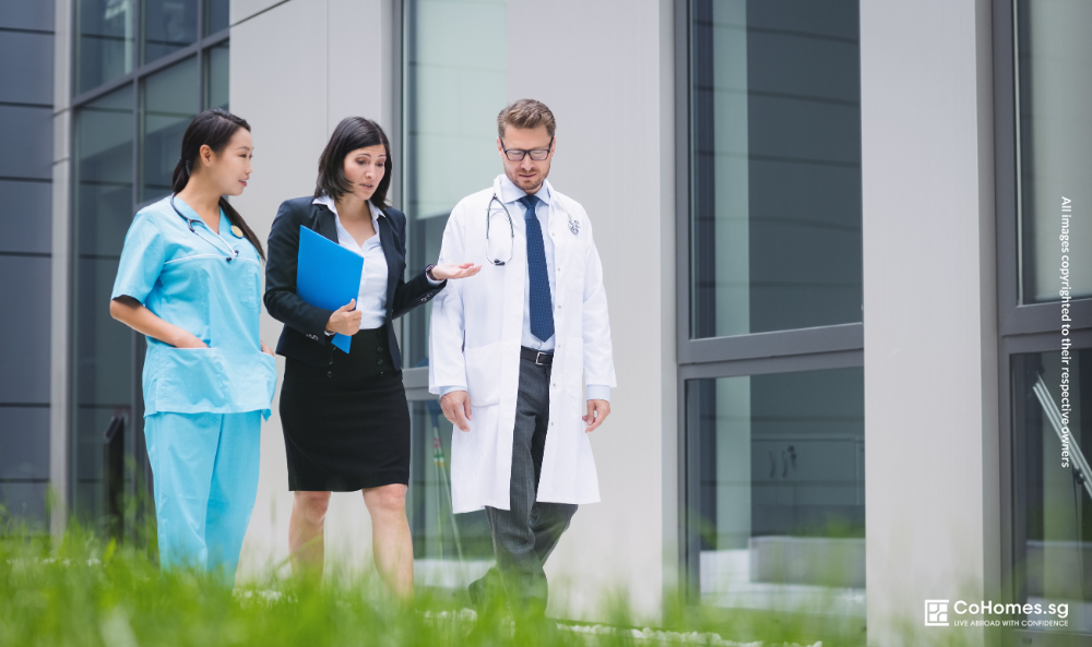 Healthcare professionals working near a hospital in Singapore