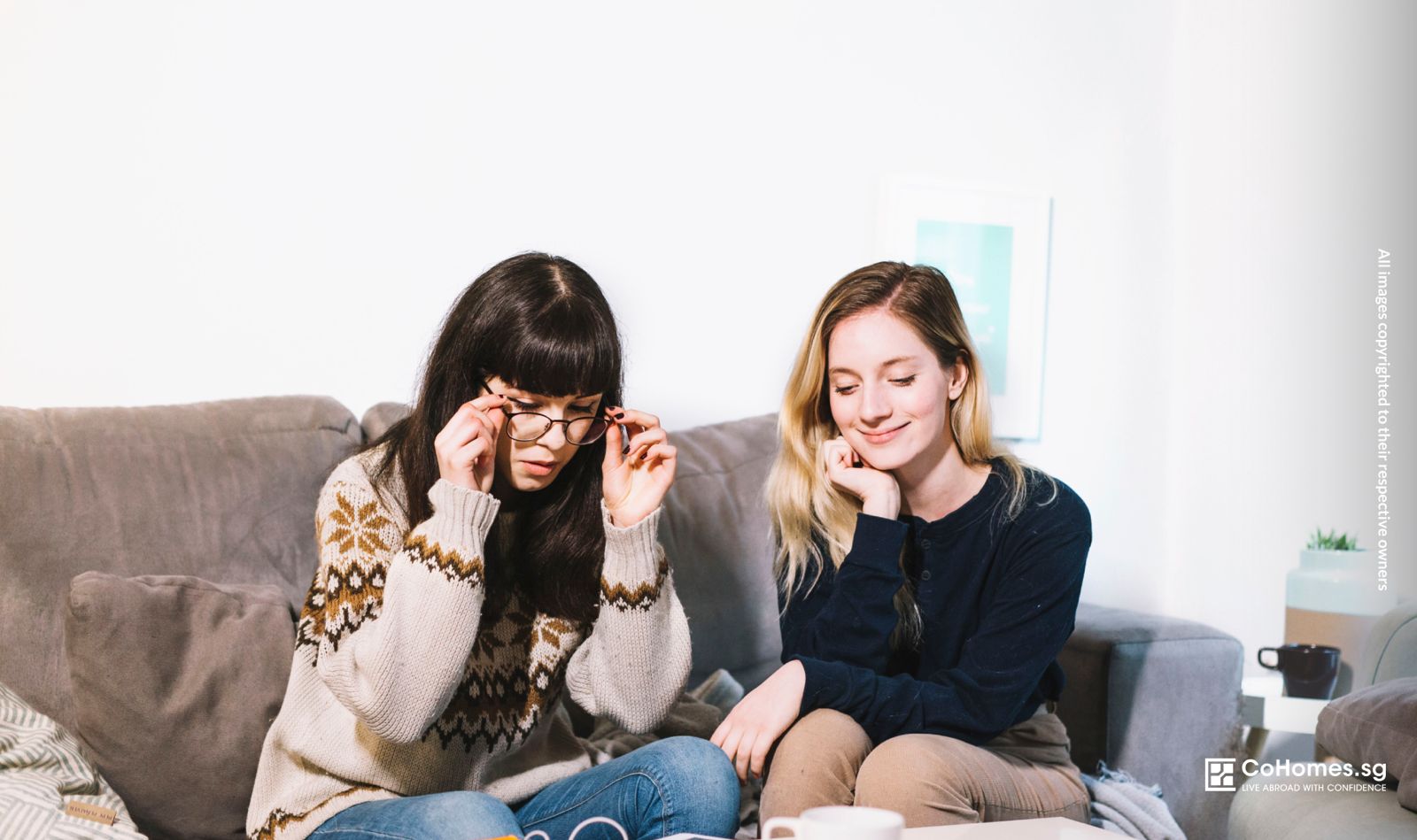 Two roommates chatting and spending time together in a shared living space