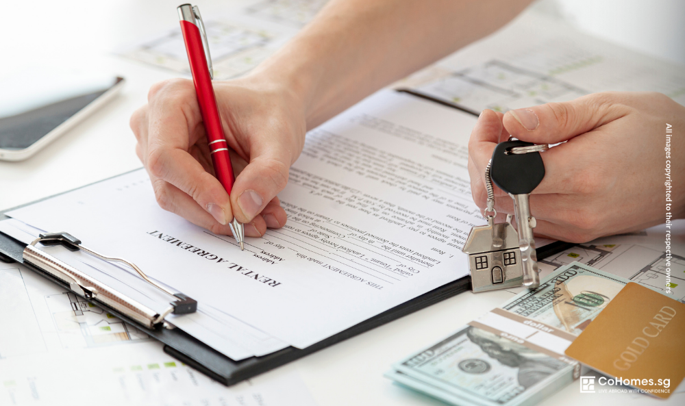 Person signing a rental agreement with a security deposit